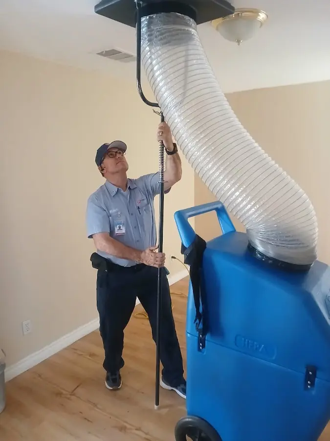 Mini Split Installation technician using HEPA equipment in Goddard